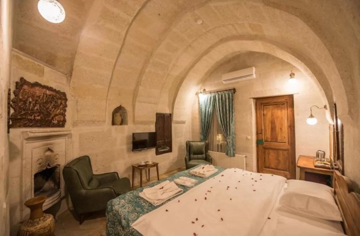 Luxury cave hotel in Cappadocia with hot air balloon view