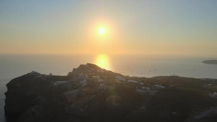 Island resort in Santorini with caldera sunset